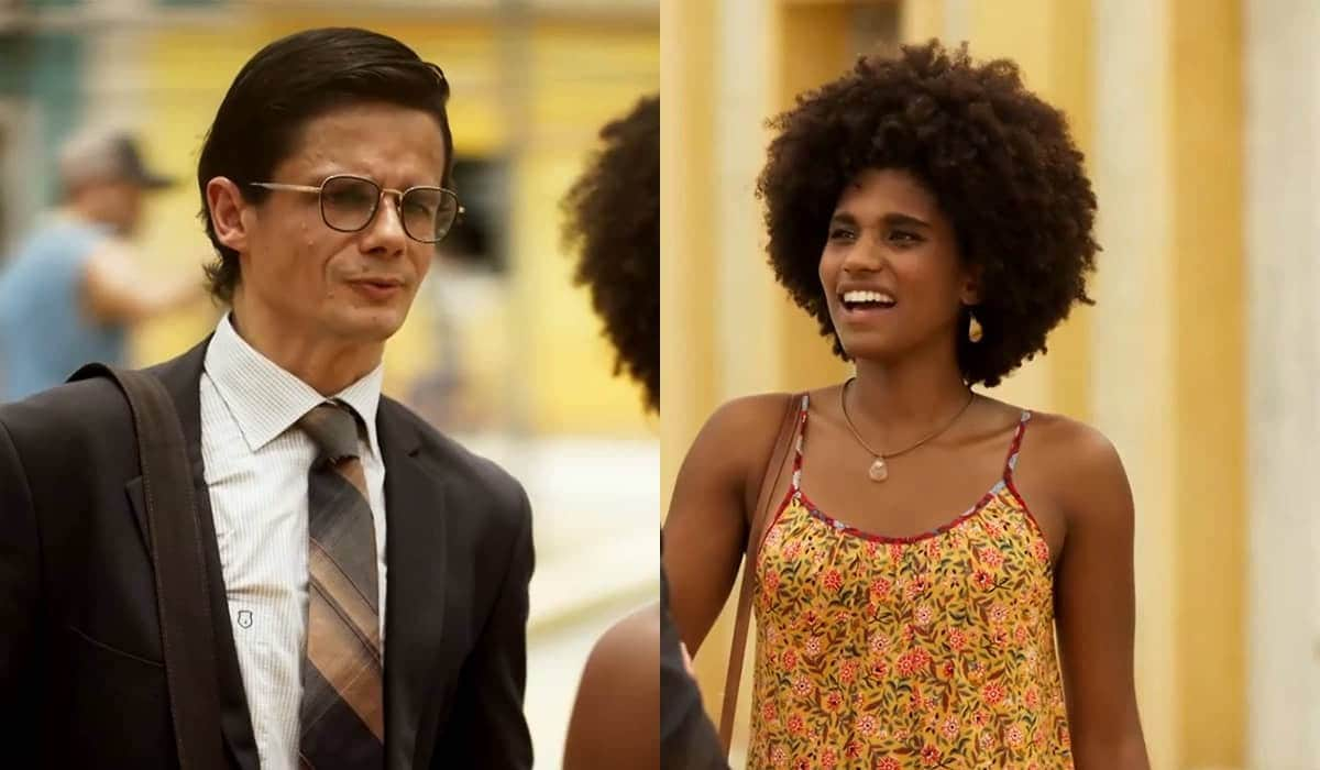 Firmino, de terno e gravata, diante de Lorena em cena da novela Mar do Sertão