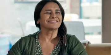 Lígia sorrindo em cena de Três Graças.