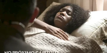 Niara na cama, com os olhos fechados, doente, em cena de A Nobreza do Amor.