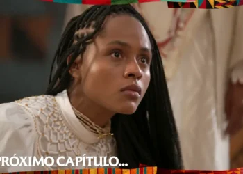 Cena da novela A Nobreza do Amor mostra Alika com cabelos longos trançados, usando uma blusa branca com detalhes dourados e colares no pescoço. A princesa aparece inclinada para a frente, com expressão séria e olhar atento. A imagem traz a frase “No próximo capítulo...” e o logotipo da Globo.