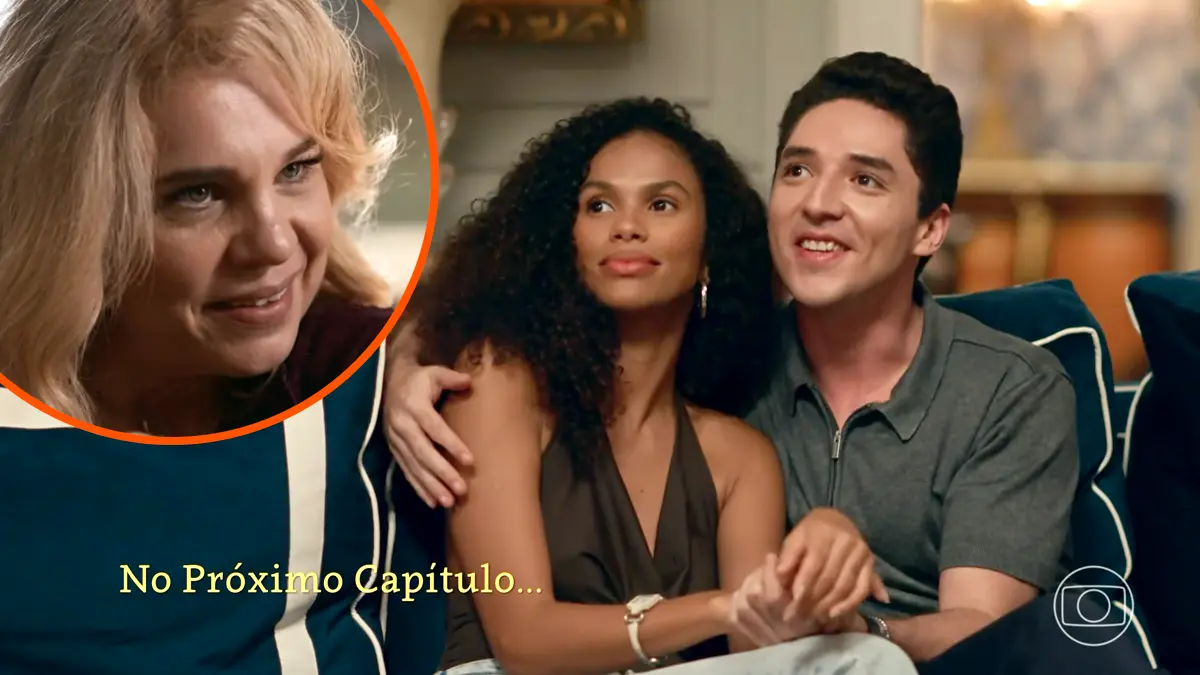 Pilar com olhar desafiador para Andréa e Rafael abraçados, sentados no sofá, em cena de Quem Ama Cuida.